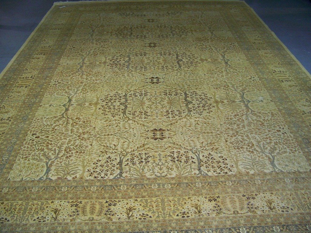 Fine Large Vintage Persian Tree of Life Rug 17'4": Fine Large Vintage Persian Tree of Life Rug 17'4" x 12'3".With a cream field and browns and other colors. Very good condition except small tear wear legs to sofa or chair was.
