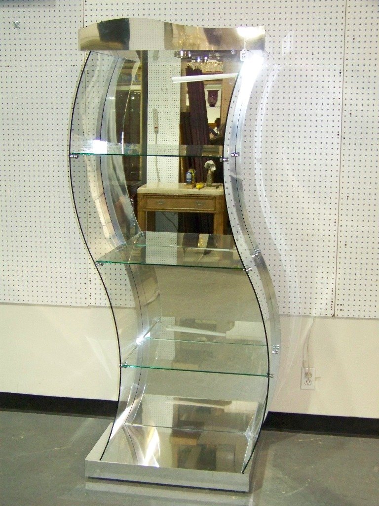 Great Chrome & Curved Glass Modern Standing Curio: Great Chrome & Curved Glass Modern Standing Curio.Great quality S Curved glass Curio with a mirrored back with three shelves. Stands app.76" tall,app.33" wide and app. 18" deep.Lighted.