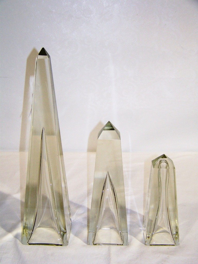 Great Set of 3 Early Glass Obelisk's: Great Set of 3 Early Glass Obelisk's.Great set each with a internal interior shape to center of each. Largest is app.15 1/2" tall,3 3/4" square base, smallest is app.7 1/2" tall, 2 3/4" square base.