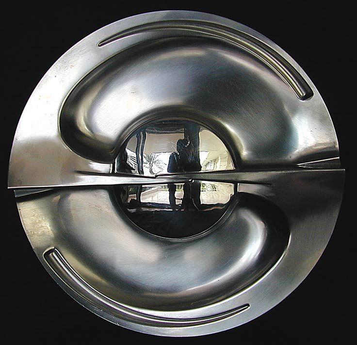 ITALIAN ALESSI CARMELO CAPPELLO SCULPTURE: A circa 1980s circular stainless steel circular sculpture designed by CARMELO CAPPELLO for ALESSI; signed with engraved Carmelo Cappello signature - ALESSI D'APRES, AFN575; 13 3/8"D, slight surface sc