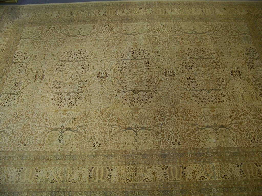 Fine Large Vintage Persian Tree of Life Rug 17'4": Fine Large Vintage Persian Tree of Life Rug 17'4" x 12'3".With a cream field and browns and other colors. Very good condition except small tear wear legs to sofa or chair was. This item being re sold 
