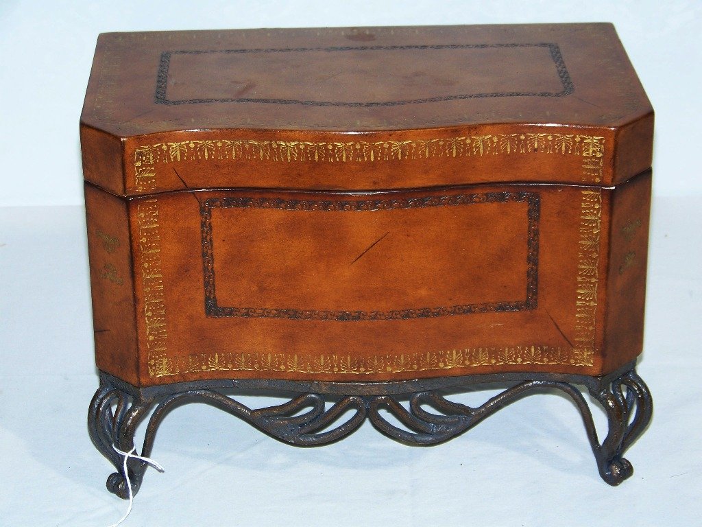 Maitland Smith Leather & Iron Footed Decorator Box: Maitland Smith Leather & Iron Footed Decorator Box. Great tooled leather box with and iron base. Stands app.10 1/2" tall 14" long and 8" deep.