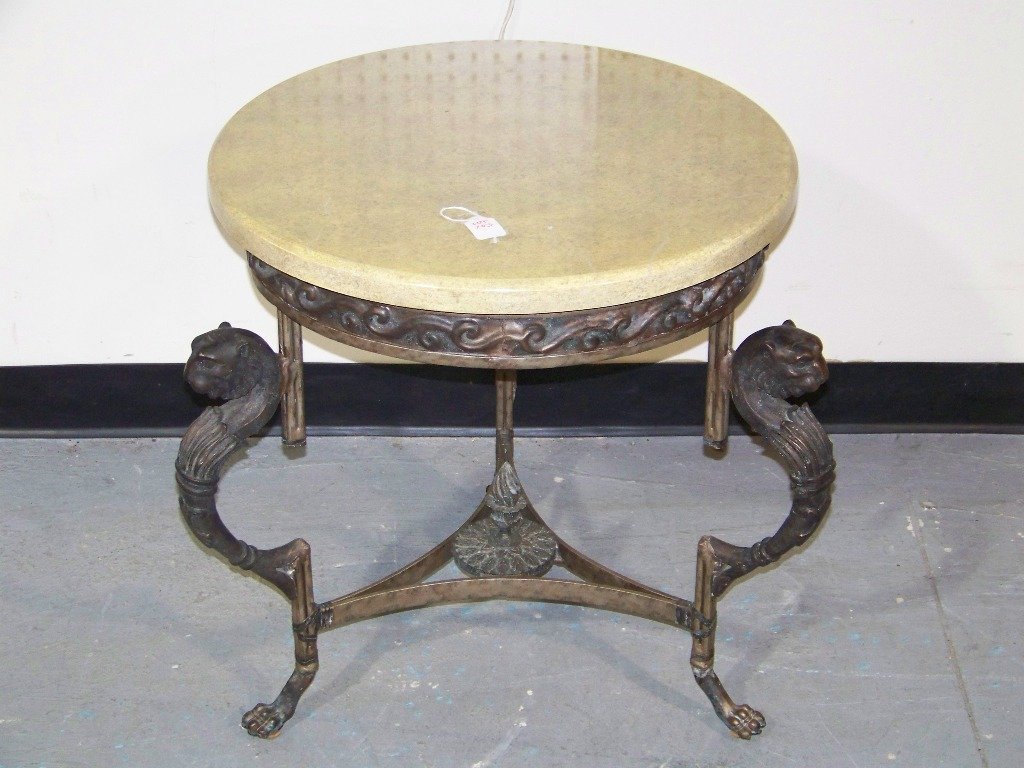 Fine " Kreiss" Bronze & Marble Top Claw Footed Tab: Fine " Kreiss" Bronze & Marble Top Claw Footed Table. Resting on a claw feet.Stands app.23" tall,22" round top.Has Bronze Lion mounts and also feet with iron supports.