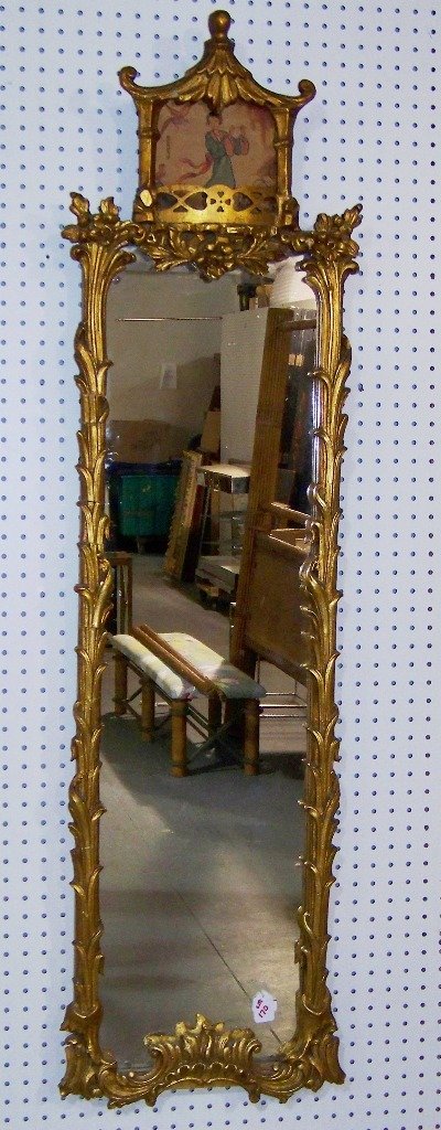 19th C. Ornate Gilded Chinese Pagoda Top Mirror 58" Ta: 19th C. Ornate Gilded Chinese Pagoda Top Mirror 58" Tall.A fine mirror with a hand painted of a Chinese Lady playing Flute and signed.Mirror is app. 57 1/2" tall,16" wide.Has old repairs as shown.All 