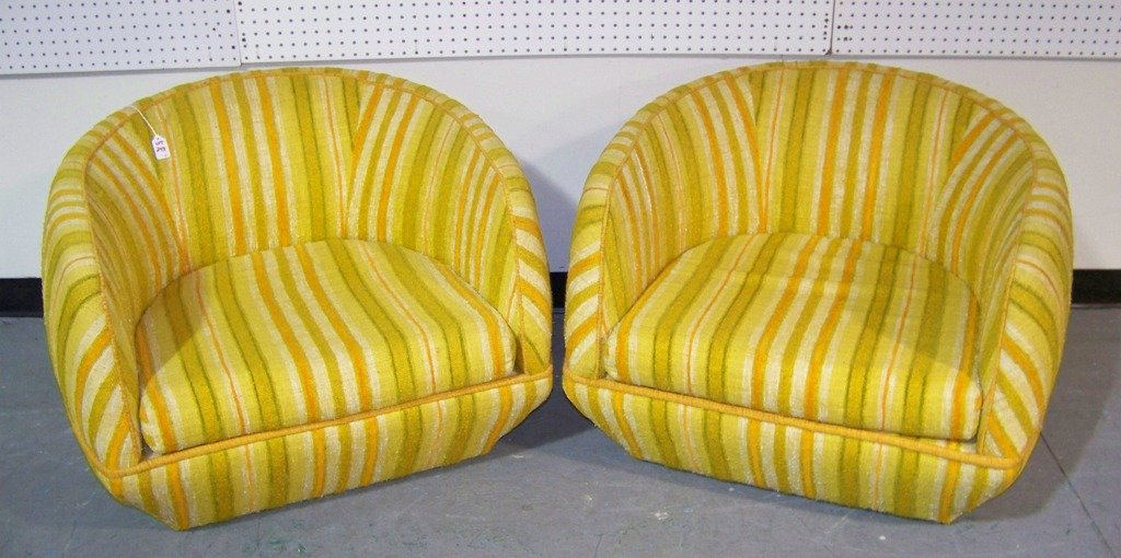 Killer Pair of Mid Century Modern Round Chairs w/ Origi: Killer Pair of Mid Century Modern Round Chairs w/ Original fabric.Fabric in a yellow,orange,green whites and others.Great shape to each and each is app.26" tall,33" wide and app.30" deep.