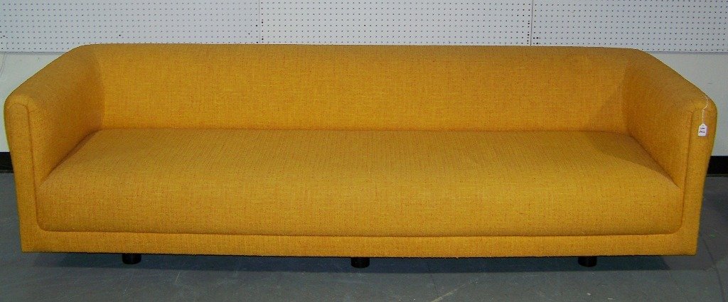 Killer Mid Century Modern Orange Rolled Arm 8'6" Sofa: Killer Mid Century Modern Orange Rolled Arm 8'6" Sofa. Great sofa resting on six round wooden feet.In the original burnt style orange color fabric. Sofa is 8"6" long,App.28" tall and app.34" deep.