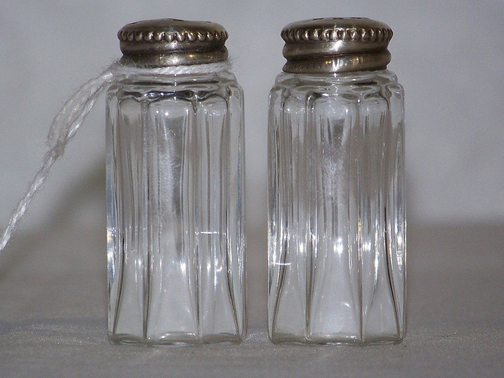 Pair Early Christofle Sterling Topped Salt & Pepper Sha: Pair Early Christofle Sterling Topped Salt & Pepper Shakers.Each is app.2" tall.