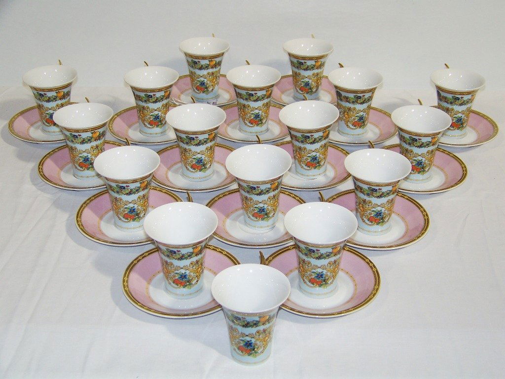 16 VERSACE "Le Jardin de Papillons" Cups & Saucers: 16 VERSACE "Le Jardin de Papillons" Cups & Saucers. Great set of cups and saucers by Rosenthal studio line.All in like new condition.Cups are app.3 5/8" tall x 4 1/2" across handle.VERSACE "Le Jardin