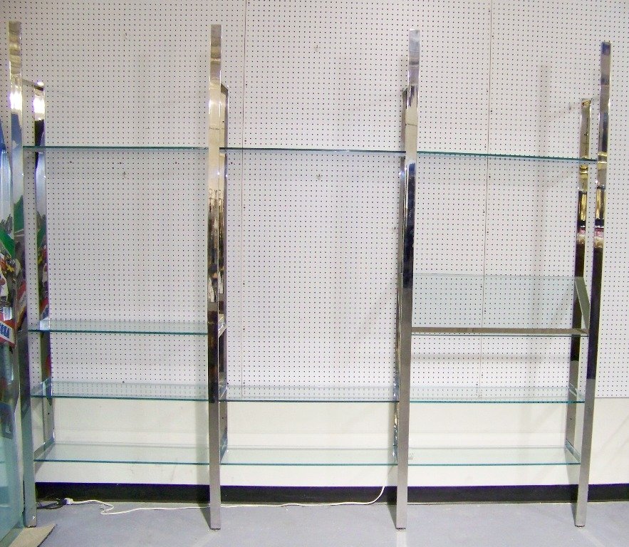 Mid C. Modern Milo Baughman Chrome Display Unit: Mid C. Modern Milo Baughman Chrome Display Unit. Killer chrome shelving unit with 4 chrome shelf supports and each being 7'11" tall,app. length is 9'Long and app.12" deep.14 glass shelves. with one sh