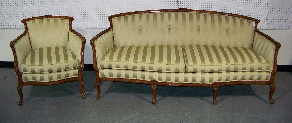 Early French Ornate Carved Sofa & Matching Side Chair: Early French Ornate Carved Sofa & Matching Side Chair. Each upholstered in a light green and gold striped silk material.Sofa is app.37" tall,6'8" long and app.35" deep resting on 6 legs. Chair is app.