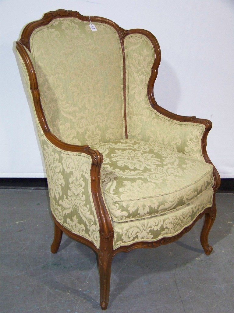 Early French Ornate Carved Wing Back Chair: Early French Ornate Carved Wing Back Chair.Great carved Wing back arm chair.Stands app.3'6" tall,29" wide and app.32" deep.