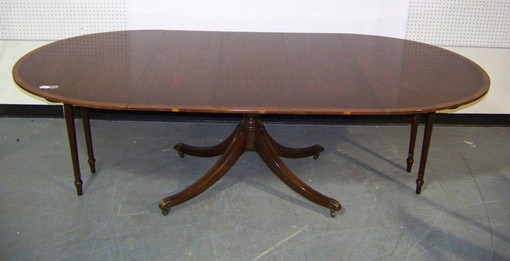Baker Inlaid Banded Oval Pedestal Dining Table & Chairs: Fine Baker Inlaid Banded Oval Pedestal Dining Table with 3 - 14" leafs and Leaf holder. Table is app.28 1/2" tall,54 1/4" long and 46" wide resting on a pedestal base.Set comes with 4 Queen Anne side