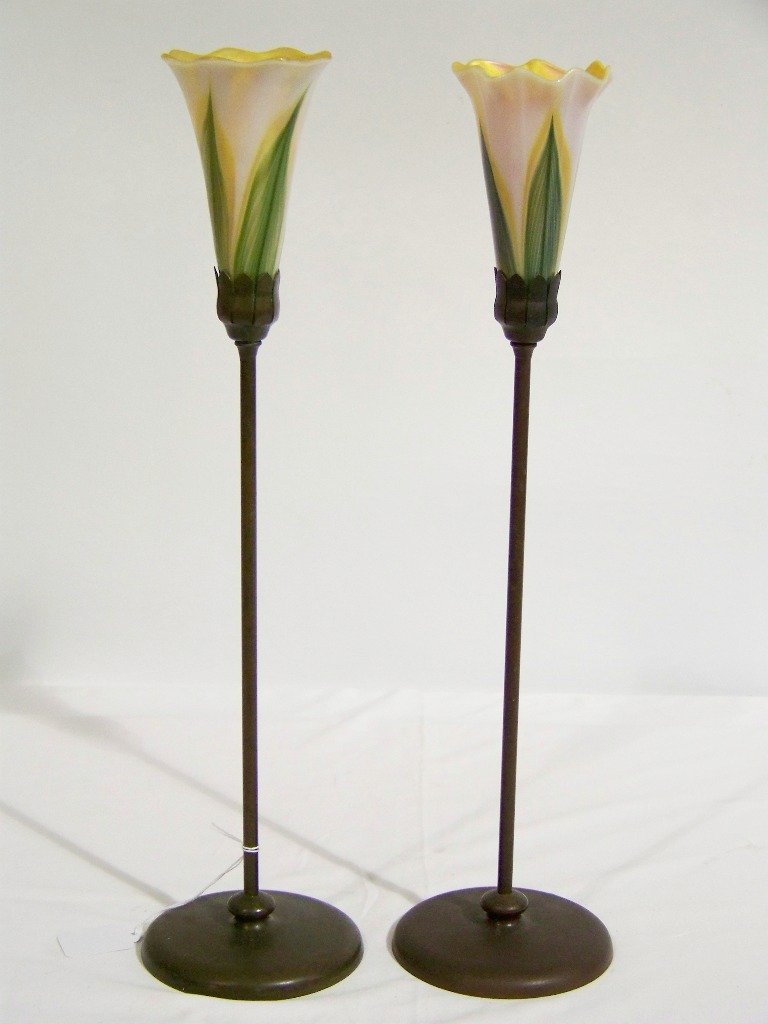 Pair of Tiffany Studios 14" Bronze Candle Holders: Pair of Tiffany Studios 14" Bronze Candle Holders with signed LCT favril Glass Shades.Each bronze base stamped Tiffany Studios New York # 547.Each shade is app.4 3/4",base is 14 1/4" tall.Each base ha