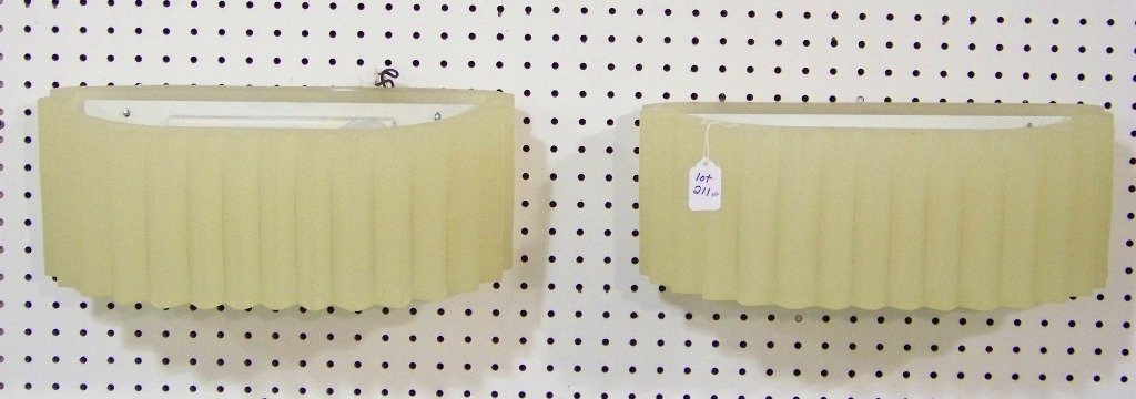 Pair Mid C. Modern Lucite Sconces by Sirmos: Pair Mid C. Modern Lucite Sconces by Sirmos.Great pair with each being 6" tall, 16 1/2" wide and 7 3/4" deep.Another matching pair is next lot #212.
