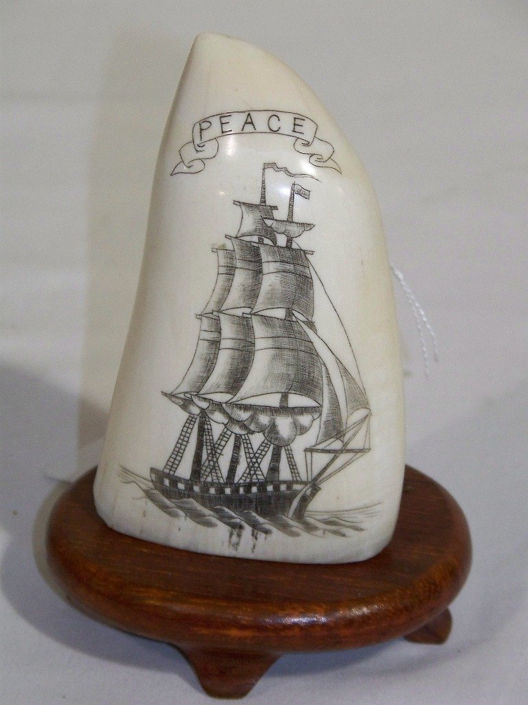19th C. Scrimshaw Whale Tooth of Sailing Ship "Peace": 19th C. Scrimshaw Whale Tooth of Sailing Ship "Peace". Stands app.4 1/4: tall and app.2 1/2" wide and 1" deep.5 1/4" on stand.