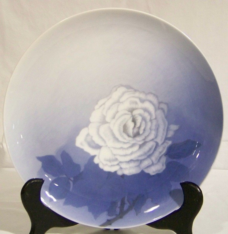 C.Zernichow 12" Charger for Royal Copenhagen: C.Zernichow 12" Charger for Royal Copenhagen. Great charger with a fine hand painted white Rose on a blue background.dated 1922 on back and signed.