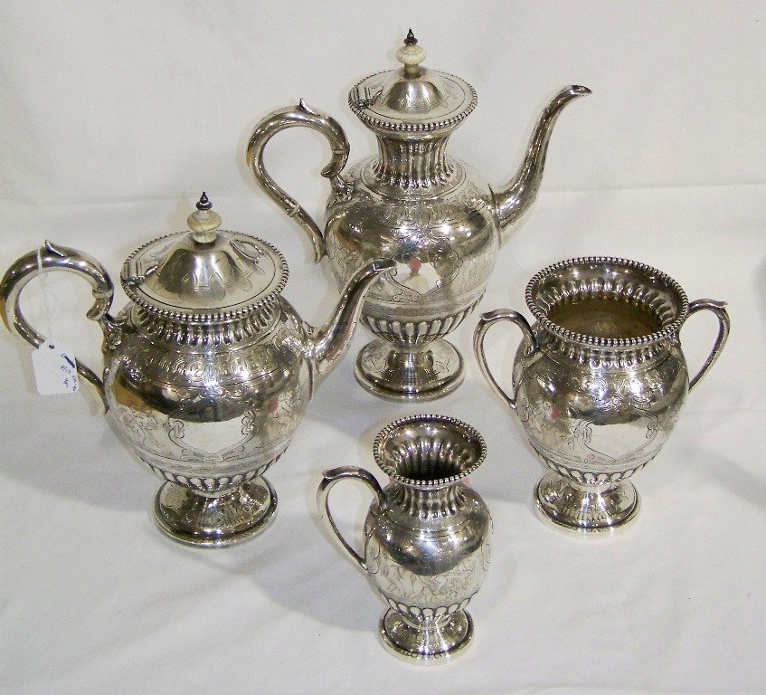 19th C. Roberts & Belk 4 Pc.Ornate Sterling Tea Set: 19th C. Roberts & Belk 4 Pc.Ornate Sterling Tea Set. A very fine set with fine carving of Cherubs.Some pulling a Chariot, some playing music and other Mythical scenes.Set is hallmarked for Samuel Robe