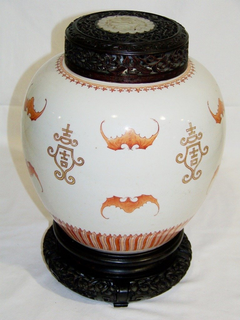 18/19th C. Chinese Ginger Jar w/Bats & White Jade Carve: 18/19th C. Chinese Ginger Jar w/Bats & White Jade Carved Insert in fine carved top.Fine hand painted with Bats for good fortune and symbol for longevity.Painted in a brunt red to orange colors.Jar is 
