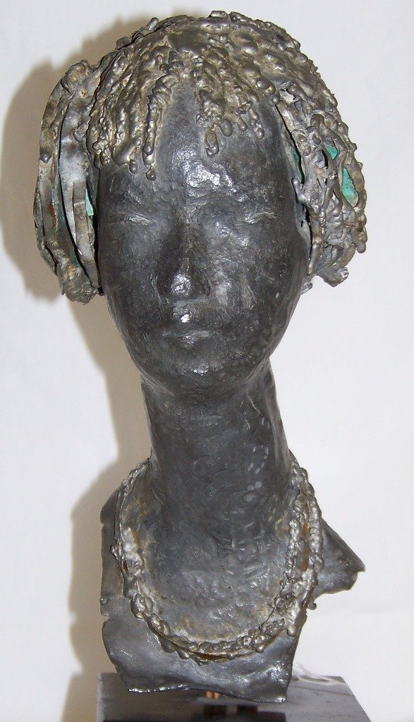 Hammered Lead Figural Statue by John Cavanaugh: John Cavanaugh (American, 1921-1985) Lead Portrait Hammered Lead Figural Statue by John Cavanaugh, American, mid-20th century, a lead figure,with wood plinth base; 10 1/2" high, 14" high with base. Jo