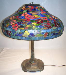 Tiffany Studios Lead Glass Table Lamp: Tiffany Studios Lead Glass Table Lamp. Great lead glass shade signed Tiffany Studios New York 1533 with multi colors and Flowers throughout.Shade is app.18 1/4" across Base and app.8" tall, bronze bas