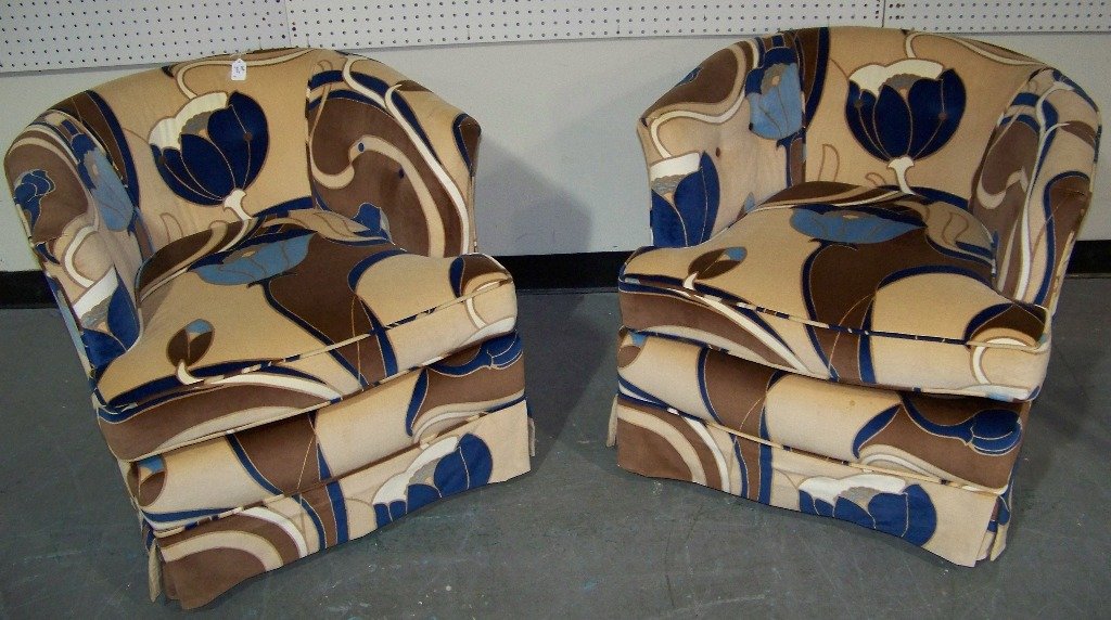 Pair of Funky Mid C. Modern Arm Chairs: Pair of Funky Mid C. Modern Arm Chairs. Killer pair of chairs in a funky Flower fabric.Each is on Castor's and each is 26" tall,29" wide and app.31" deep.