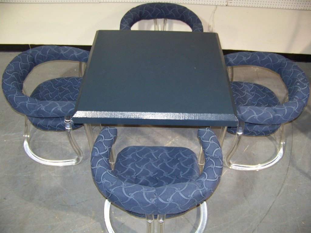 Mid C. Modern Lucite Games Table & 4 Lucite Arm Chairs: Mid C. Modern Lucite Games Table & 4 Lucite Arm Chairs. Table has a blue Rafi style material top.Stands 28" tall,38" square top.Chairs have 2" round Lucite supports and each is app.26 1/2" tall,28" wi