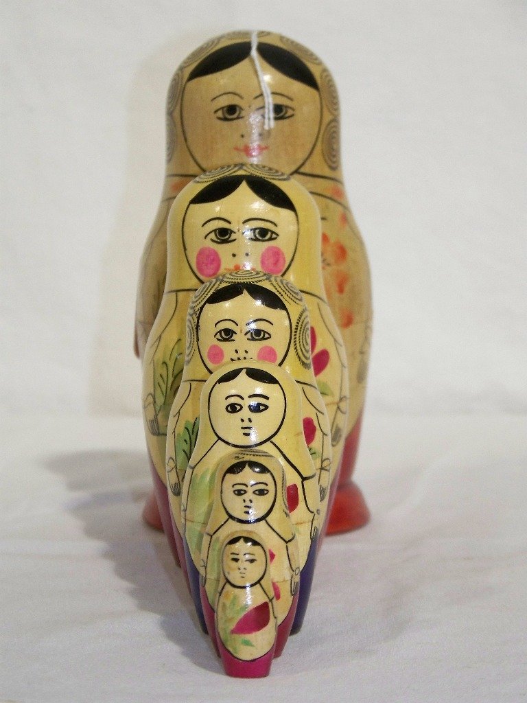 Vintage Set of 6 Russian Hand Painted Nesting Dolls: Vintage Set of 6 Russian Hand Painted Nesting Dolls. Tallest is app.6 1/4" tall and smallest is 1 3/8" tall.