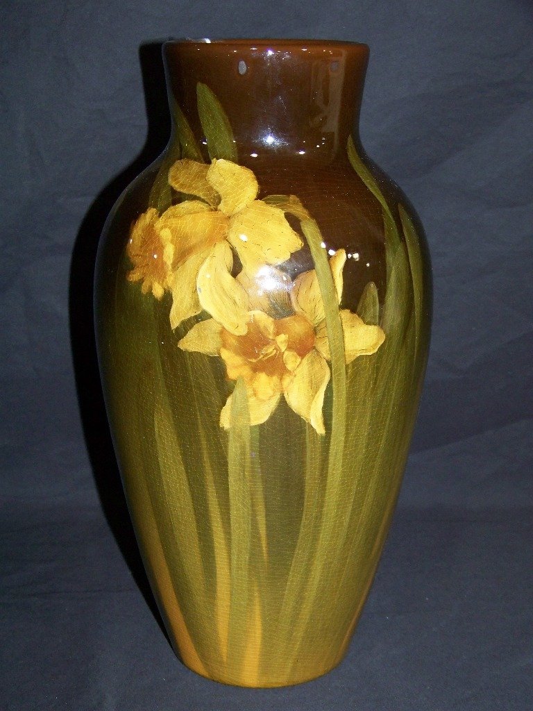 ROOKWOOD POTTERY VASE: ROOKWOOD POTTERY VASE American. Date mark for 1902. Pattern No. 926B. Of tapering ovoid form with brown to gold glaze with hand painted Flowers. Height 10 3/4".