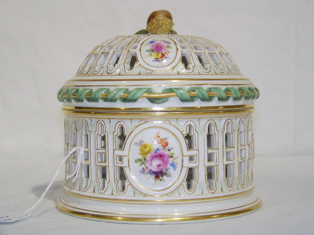 19th C. Meissen Porcelain Reticulated Chesnut Covered: 19th C. Meissen Porcelain Reticulated Chesnut Covered Box. Great porcelain box by Meissen with wonderful hand painted decorations and a Chesnut finial to lid.Box is app.6 1/2" tall and app.6 3/4" acro