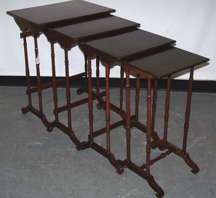 Regency Style Set of Mahogany Nesting Tables: Regency Style Set of Mahogany Nesting Tables.English C.1900 each with a double brass border.Largest is 28" tall,21 3/4" wide and 15 3/4" deep.Smallest 13 1/2" x 11 1/2", 26" tall.