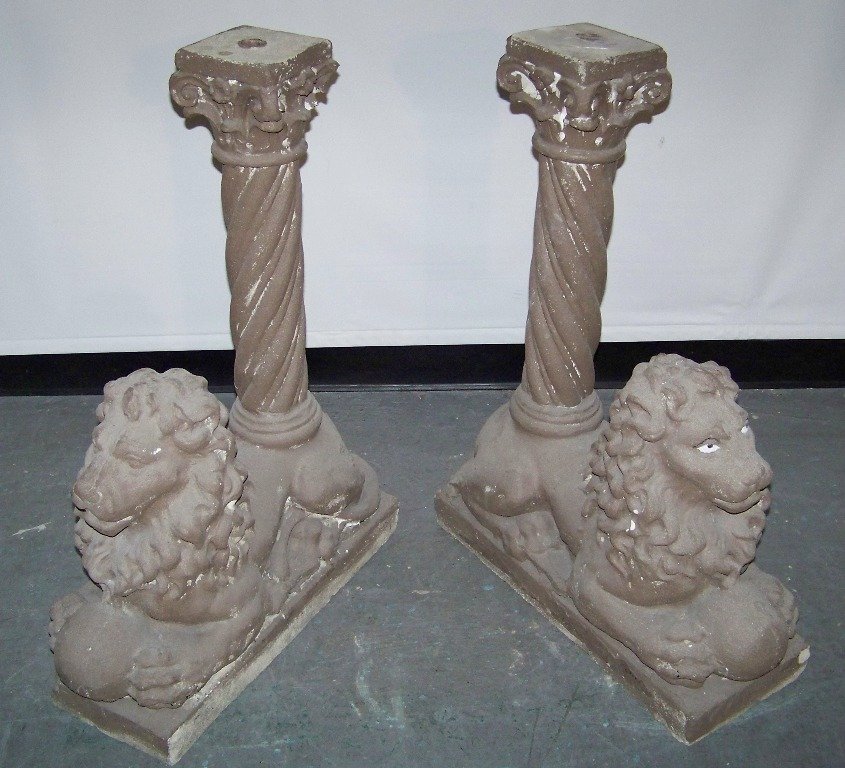 Early Concrete Lion Based Corinthian Coloumn Lamp Posts: Early Concrete Lion Based Corinthian Coloumn Lamp Posts. Great early pair with Lion laying down with a ball in feet.Has a corinthian coloumn on back for what looks to have been maybe for lamps.Each is