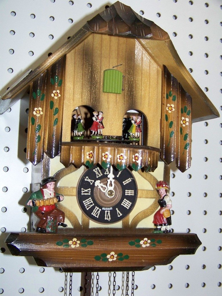 Early German Coo Coo Clock "Blaue Donau".: Early German Coo Coo Clock "Blaue Donau". A fine German Co Co clock working and is app.12" tall,9 1/2" wide and 7" deep.