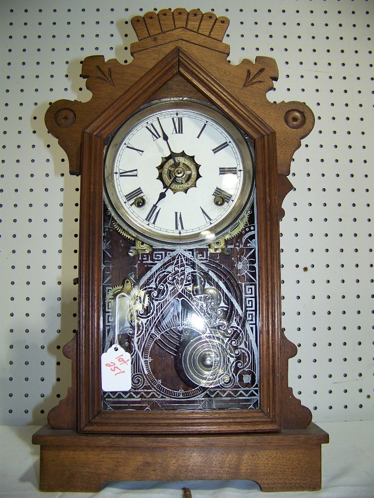 19th C. Walnut Working Shelf Clock: 19th C. Walnut Working Shelf Clock.Stands 20" tall,11" wide and 4" deep.