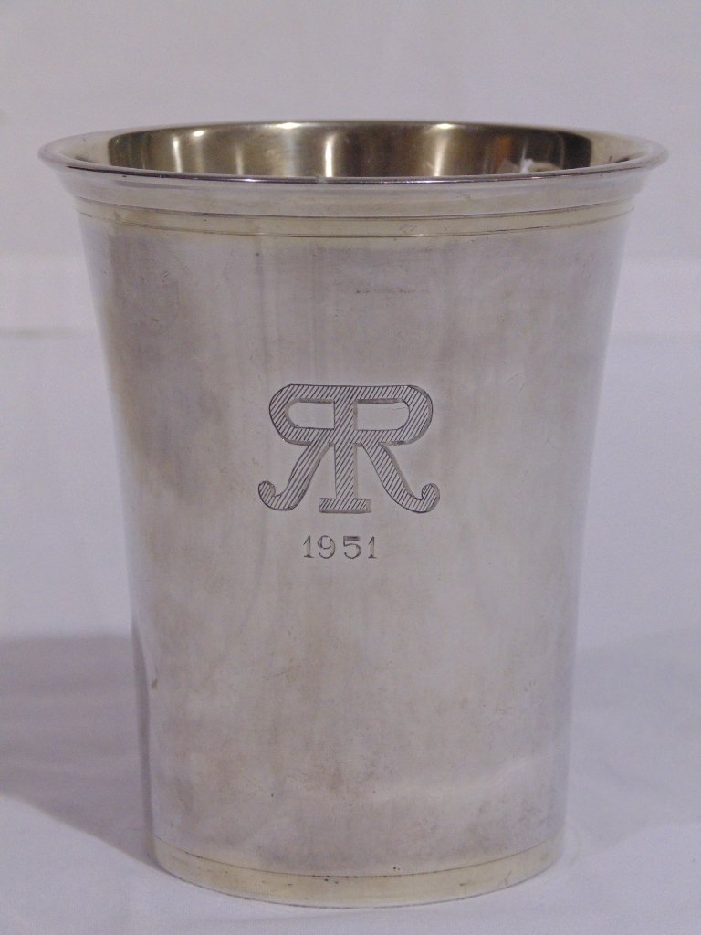 PETER GUILLE NEW YORK STERLING SILVER BEAKER CUP: PETER GUILLE NEW YORK STERLING SILVER BEAKER CUP. Dated 1951 with monogram on front of cup.Cup is 4 3/8" tall,3 3/4" across top.Weight is 3.65 troy.