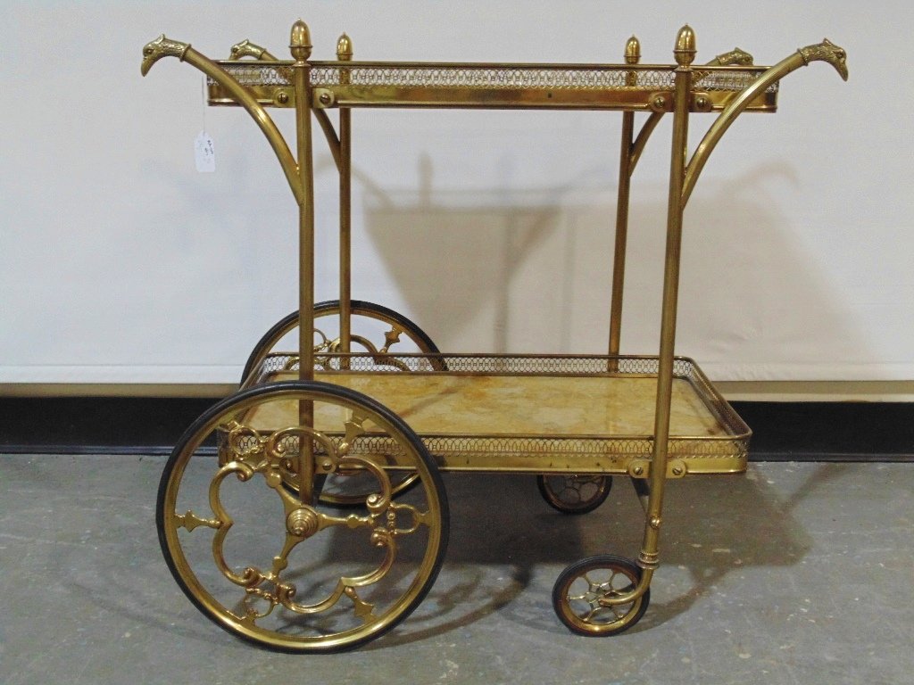 Mid C. Modern Italian Marble & Brass Tea Cart: Mid C. Modern Italian Marble & Brass Tea Cart. Has Bird head handles with a marble with brass trim top and base.Tea cart is app.27" tall,28" wide and 16 1/2" deep.