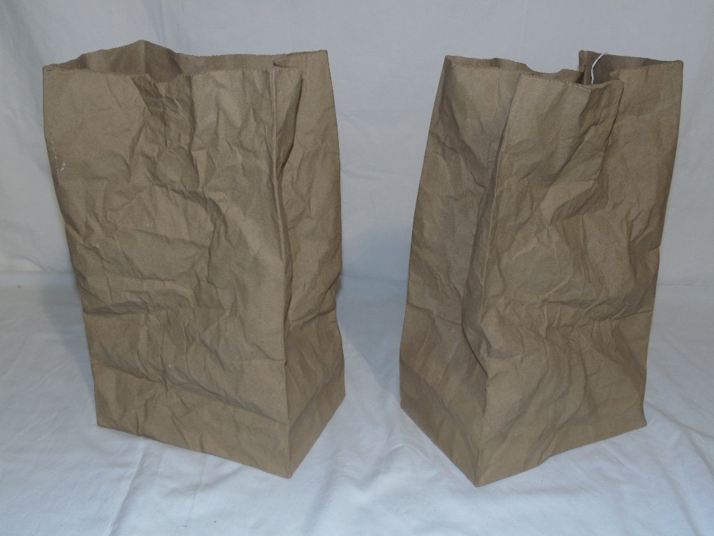 Pair Signed Mid C. Modern Clay Trash Bag Sculptures: Pair Signed Mid C. Modern Clay Trash Bag Sculptures. Great pair of trash bags, each signed and each is app.15" tall,7" deep and app.9" wide.
