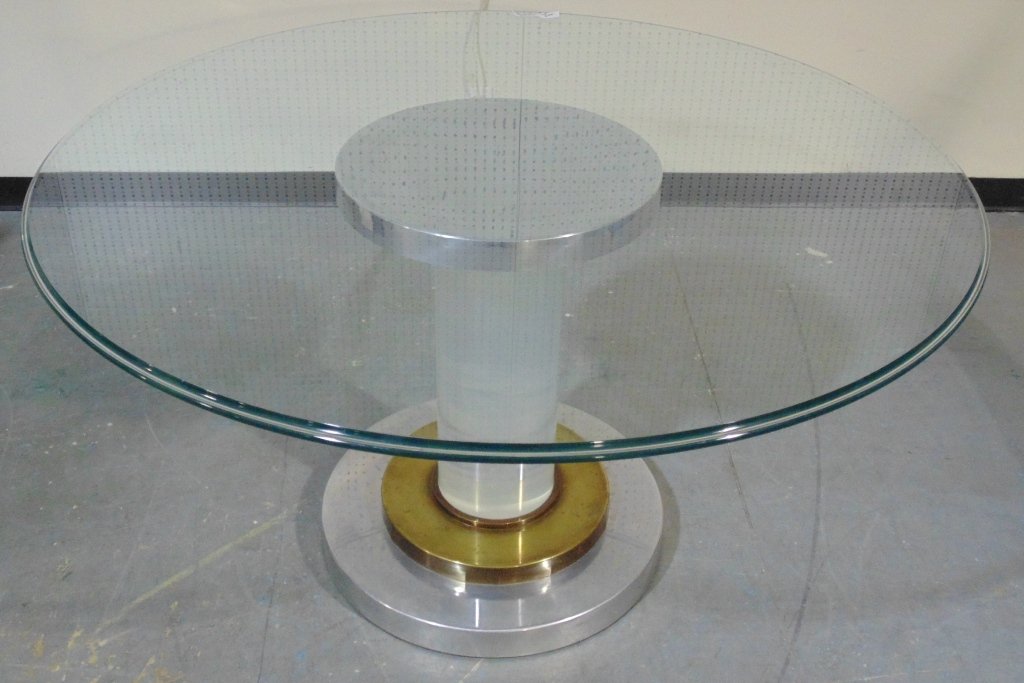 Italian Lucite dining table by Romeo Rega, early 1970s.: Italian Lucite dining table by Romeo Rega, early 1970s. A fine Lucite,brass and chrome based table by Romeo Rega. Base is app.28 1/2" tall,app.23" across base and app.19" across top.Has a 53 1/2" beve