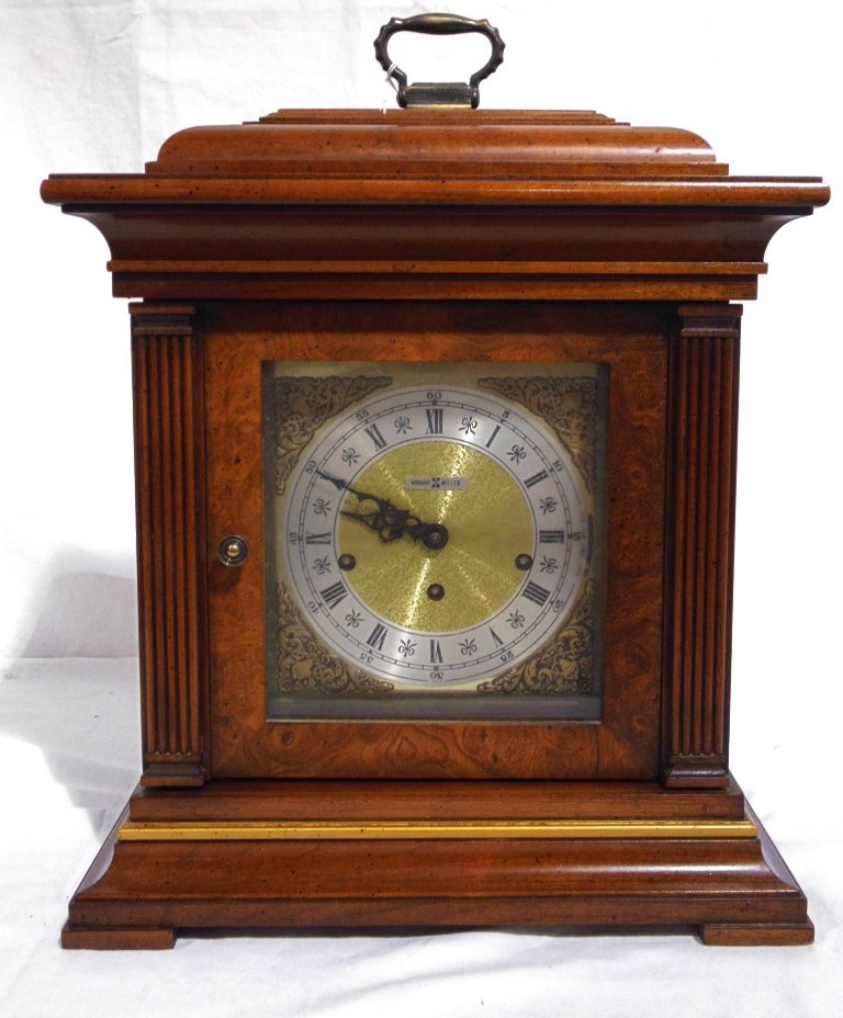 Vintage Howard Miller Westminster Chime Mantle Clock: Vintage Howard Miller Westminster Chime Mantle Clock.A fine mantle clock by Howard Miller standing app.18 1/2" tall,14 1/2" wide and 8 1/2" deep.Has no key.