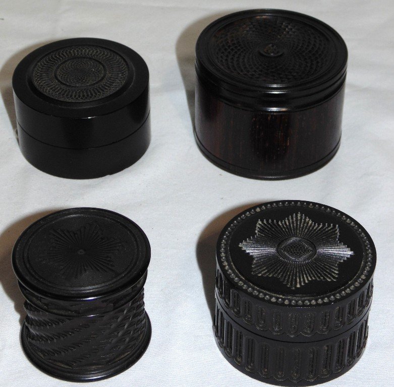 4 Wood Turned 19th C. Snuff Boxes: 4 Wood Turned 19th C. Snuff Boxes. Great set of four with the largest being 1 3/4" tall and 2 3/8" across, smallest is 1 1/2" tall and 1 3/4" across. From The Estate of Neil Leston.
