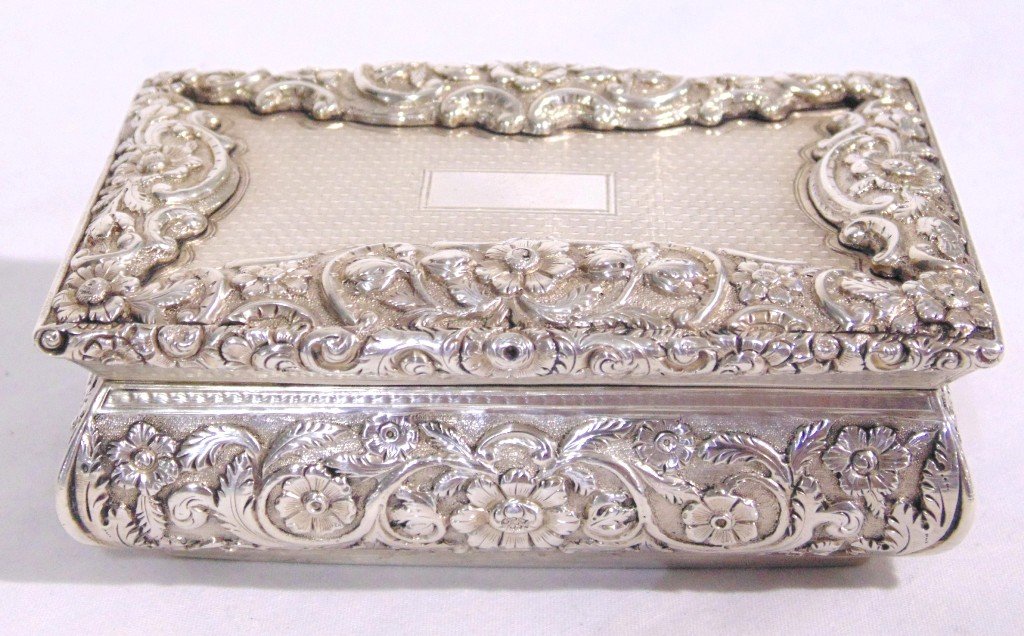 19th C.Silver Gilt Snuff Box,Joseph Willmore, 1842: 19th C.Silver Gilt Snuff Box,Joseph Willmore, 1842.Great snuff box with floral applied decorations and machine turned.Date mark for 1842.Box is 3 7/8" long,2 5/8" across. From the Estate of Neil Letso