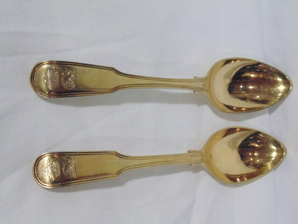 Fine 19th C. Silver Gilt Spoons by Thomas Peacock: Fine 19th C. Silver Gilt Spoons by Thomas Peacock. Great pair of silver gilt teaspoons by Peacock in a Fiddle & Thread pattern with a engraved Coronet and a Crest.Each is 6 3/8" long. From the Estate 