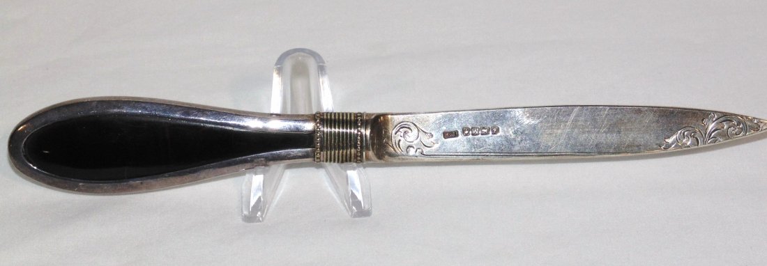 STERLING AND TORTOISE LETTER OPENER: This lot is for a sterling and tortoise 8 1/2" letter opener. The hallmarks are for London,1947, and maker - CF. Provenance: The Estate of Neil Letson