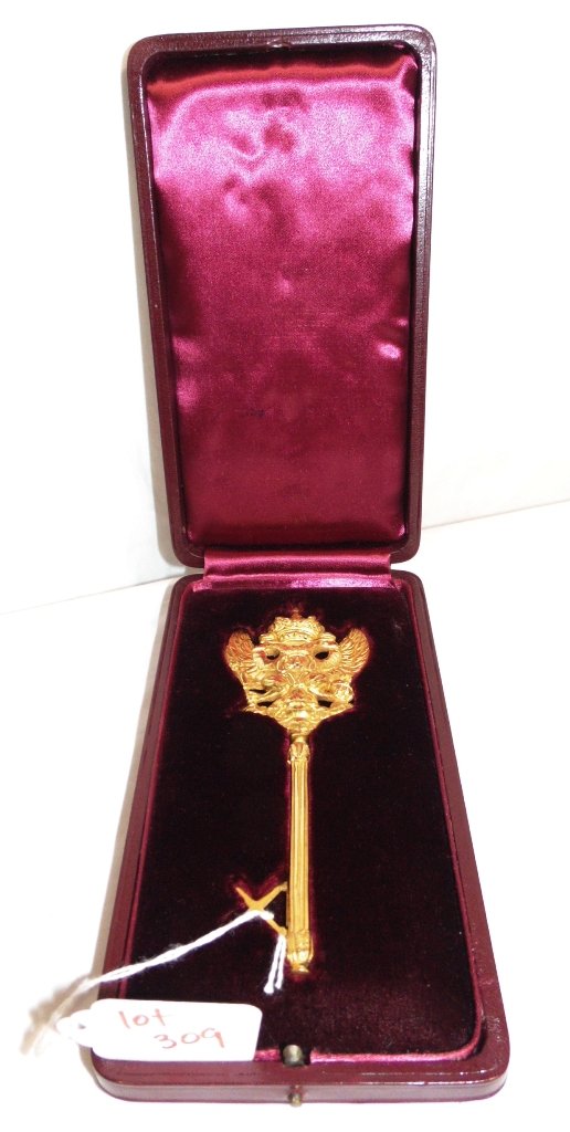 RUSSIAN GILT BRONZE KEY in Fitted Box: This lot is for a Russian gilt bronze key in a fitted box. The key is 5 1/8" long and the box is 7 3/8" x 4" x 1 1/4". Provenance: The Estate of Neil Letson