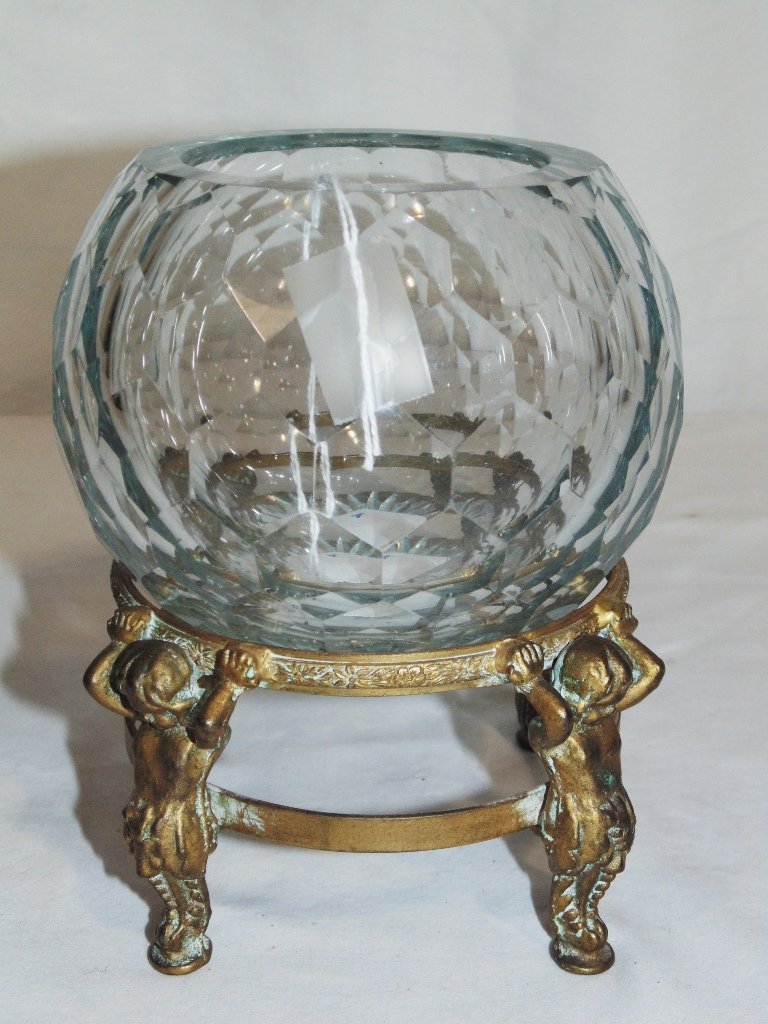 19th C. Hand Cut Crystal Honey Comb Bowl, Bronze Cheurb: 19th C. Hand Cut Crystal Honey Comb Bowl,on a Bronze Cherub figural stand.Bowl is cut with many honey comb style cuts throughout.Bowl is app.4" and base is app.3" tall resting on four Cherubs. From th