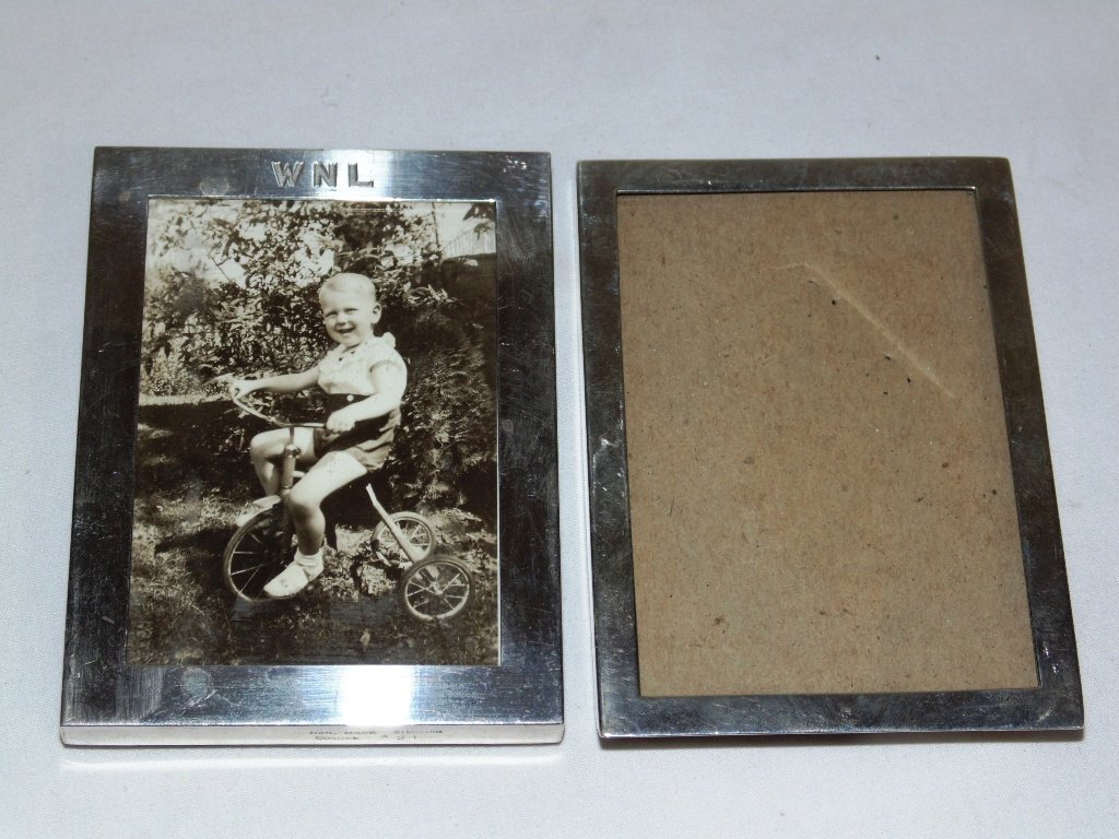 Pair Sterling Picture Frames,Cartier & 925/1000 Frame: Pair Sterling Picture Frames,Cartier & 925/1000 Frame. One stamper Cartier and is 4 1/8" tall,3 1/8" wide and monogrammed WNL for Walter "Neil" Letson and other is stamped Sterling 925/1000 Fine 01407