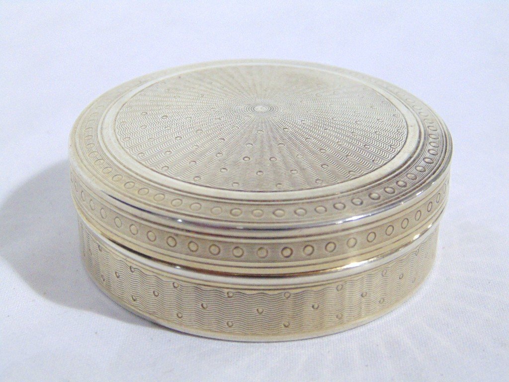 19th C. French Gilt Silver Round Snuff Box: 19th C. French Gilt Silver Round Snuff Box. A Fine 19th C. Silver Gilt French Round Snuff Box,French hallmarks,engine turned overall,2 3/8" across and 3/4" tall. From the Estate of Neil Letson.