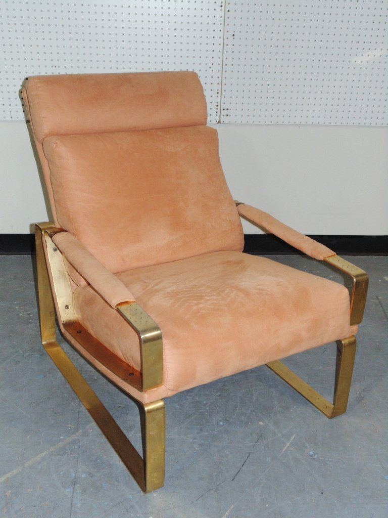 Great Mid C. Modern Brass & Leather Lounge Chair: Great Mid C. Modern Brass & Leather Lounge Chair.A great chair with a swede leather upholstery with Brass arms and leg supports,Chair is app.35" tall,27" wide and app.40" deep.In the manner of Milo Ba