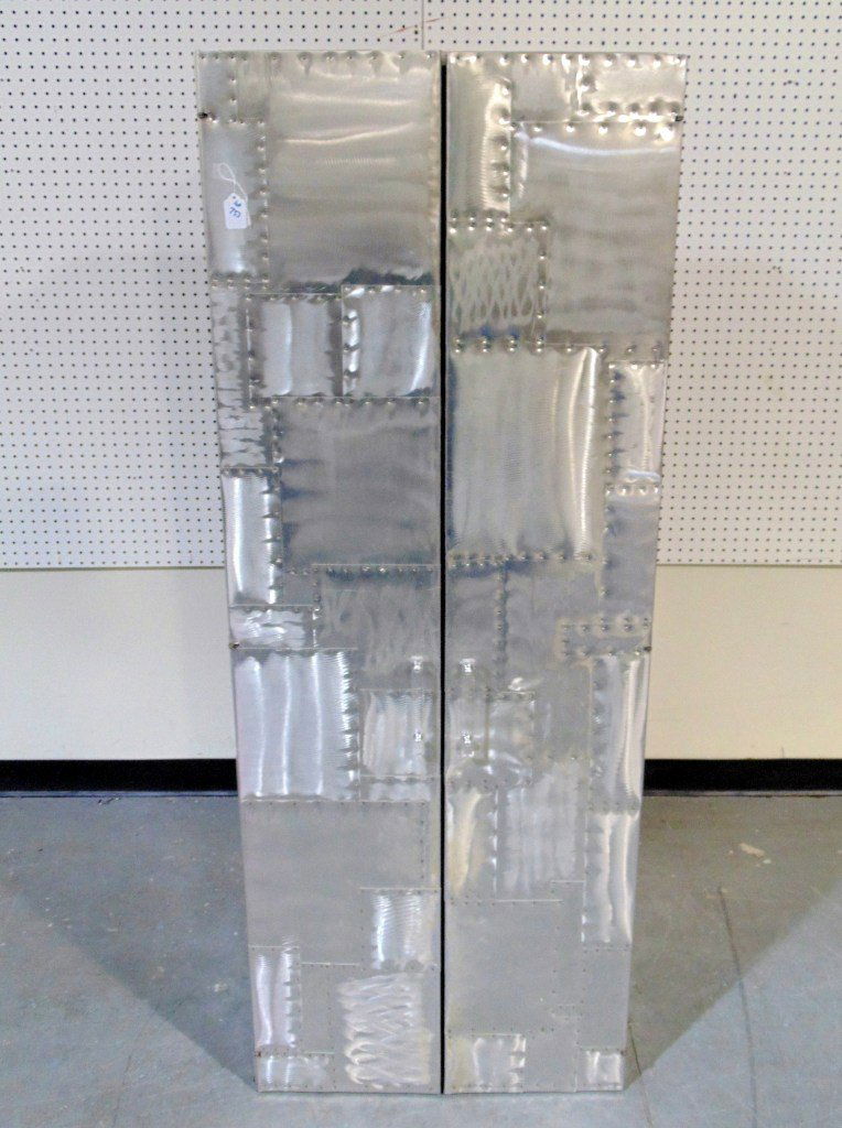 Mid C. Modern Paul Evans STYLE Patchwork Cabinet.: Mid C. Modern Aluminium Patch Work Storage Cabinet, made from square pieces of Aluminium nailed to exterior of cabinet,Has two large doors to a pink painted interior with 4 shelf's.Cabinet is 63 1/2"