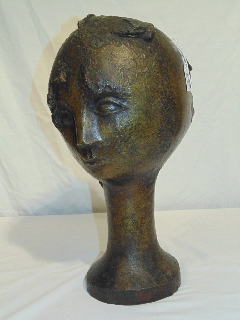 ANDRE MINAUX (Fr. 1923-1986) BRONZE HEAD 17 1/2" High: This lot is for a bronze sculpture by French artist Andre Minaux (1923 - 1986)of a woman's head. The size is 17 1/2" high x 10" wide. It is numbered EA and has a Susse, Paris foundry mark.