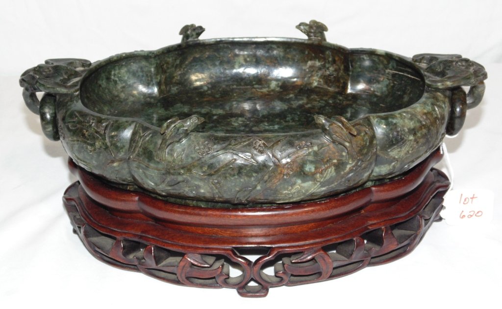 Large ANTIQUE CHINESE JADE BOWL: This lot is for a large antique Chinese jade bowl. It is decorated with bats and birds and has bat ring handles. There are 4 carved raised birds on upper rim of the bowl. The jade color is a mottled d